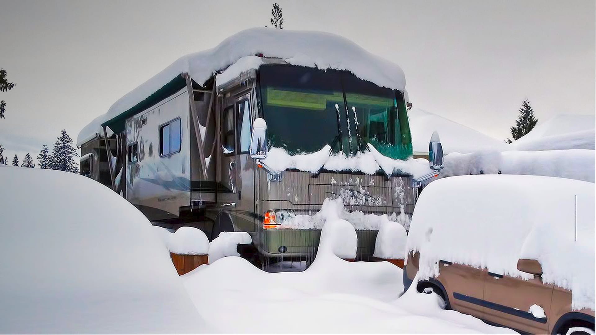 Our RV parked in the winter snow.