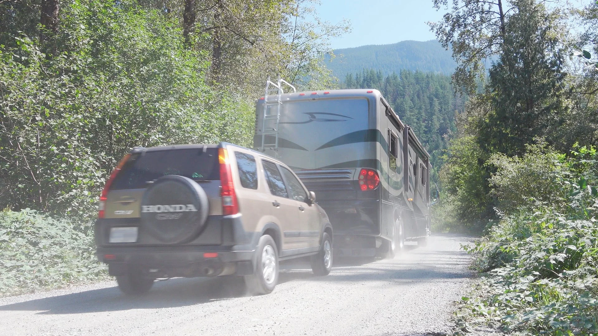 Photo of our motorhome towing our SUV with a towed car braking system