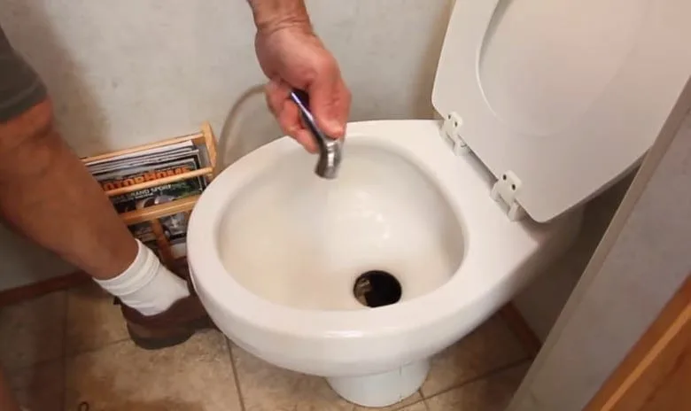 Use gentle alternatives like a sprayer when cleaning RV toilets