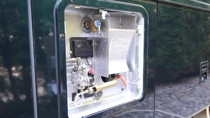 Traditional RV propane/electric water heater seen from outside RV.
