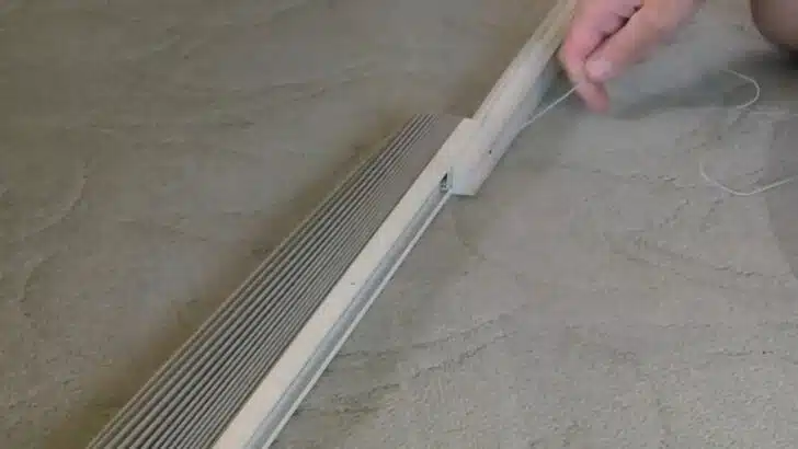 attaching the two sections of the pleated shade