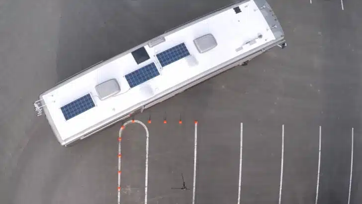 The front left side of the rig sweeps to the left when backing up a motorhome.