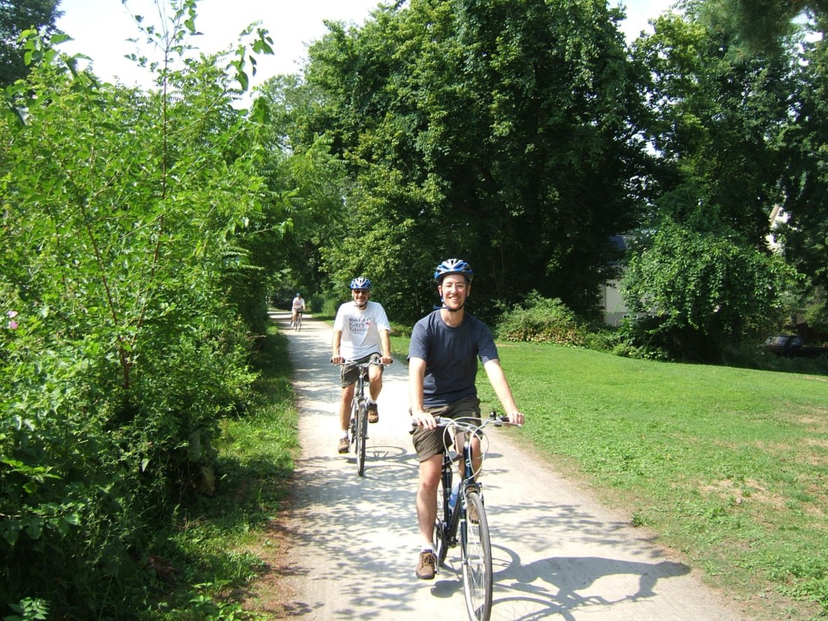 John & Peter biking in a state park