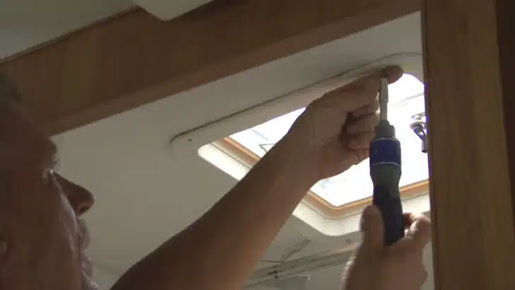 RV roof vent fan replacement starts with the removal of the interior frame.