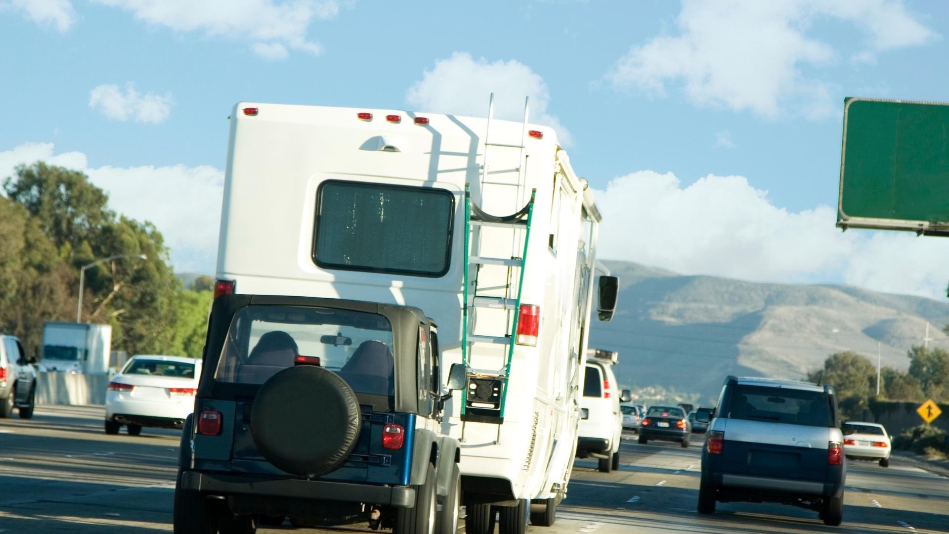 A tall, flat-sided RV driving along the highway is a fairly frequent reason behind the most common RV accidents.