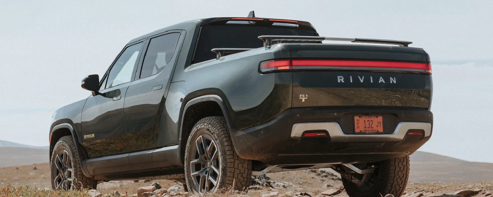 Photo of the Rivian R1T - an electric vehicle that CAN be flat-towed behind a motorhome