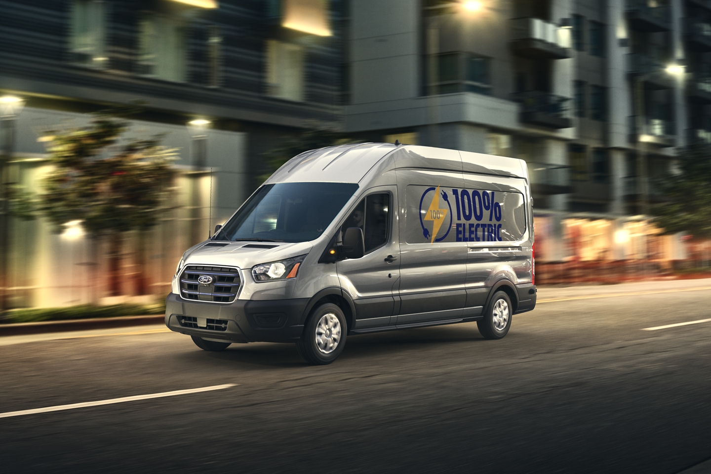 Photo of the Ford Transit Electric on the road at night