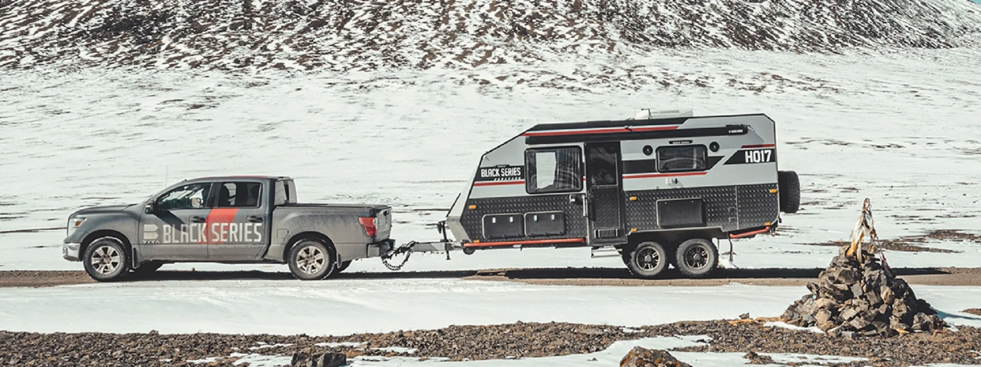 An HQ17 travel trailer during testing in the backcountry in winter
