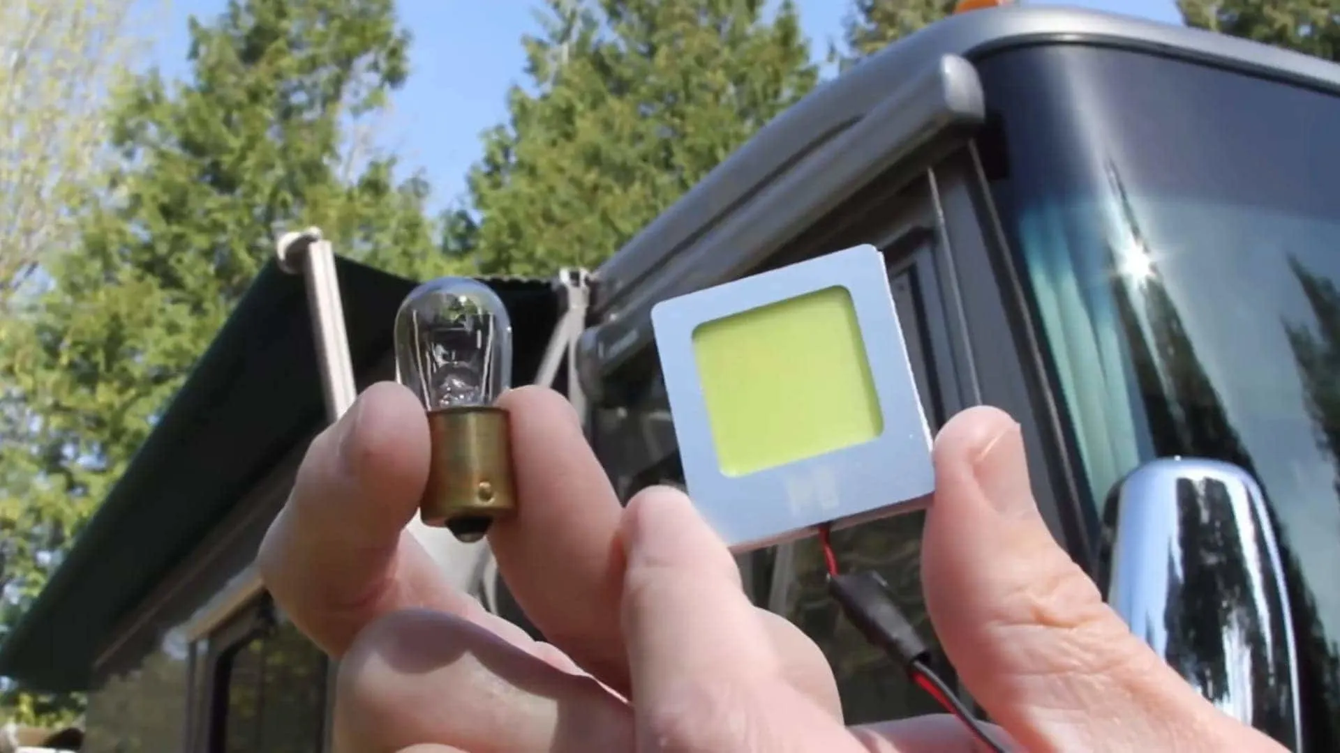 RV living tips are shown in this photo of a traditional RV light bulb and an LED RV light