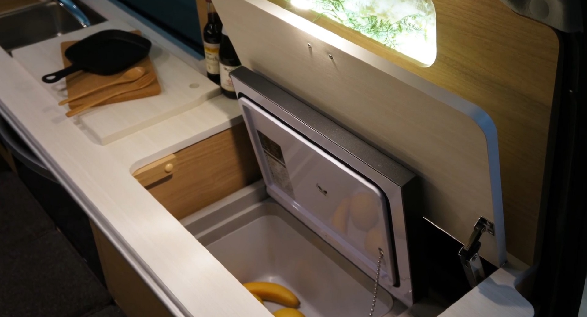 Photo of the little fridge in the Cruise Cozy camper van