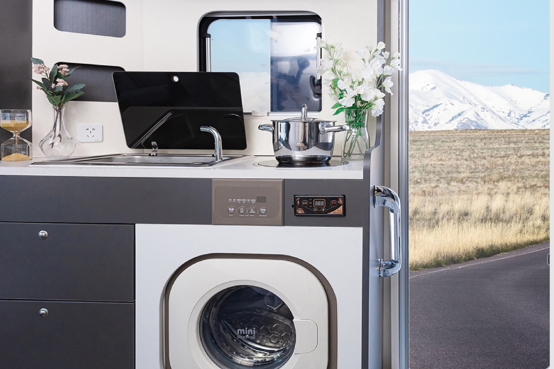Photo rendering depicting the kitchen area of a SAIC Maxus V90 Villa Edition, including the optional washer/dryer