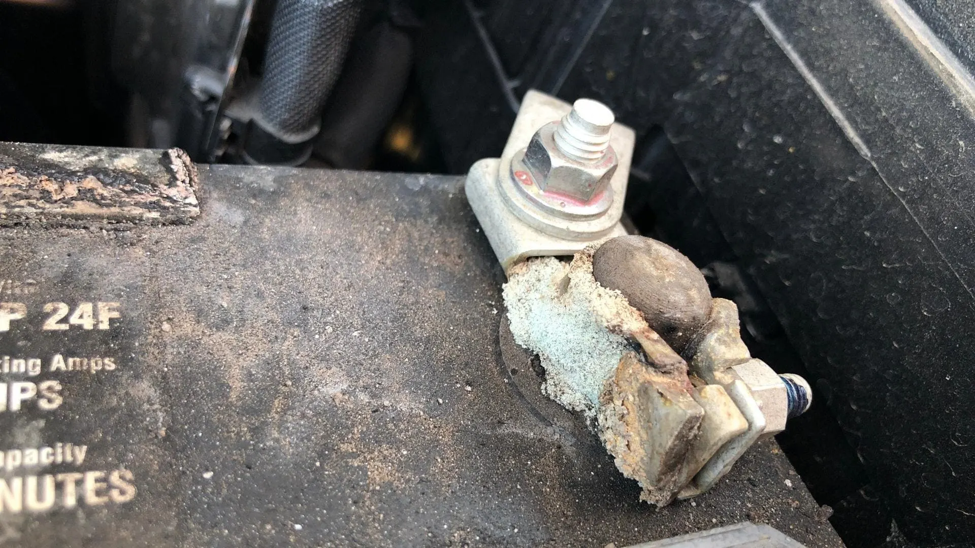 A corroded battery terminal - prevent it on your car or RV battery with a coating of WD-40
