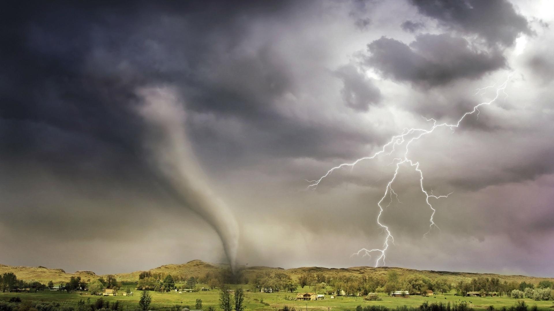RV living tips are shown in this photo of a tornado and lightning in the distance