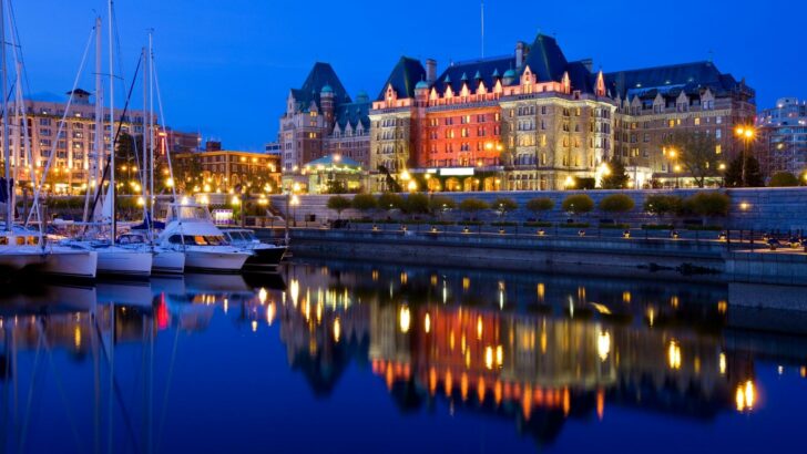 Photo of a cityscape in Victoria, British Columbia taken in the evening from the water