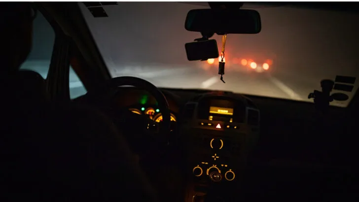 Photo of an RV being driven at night, from the driver's perspective