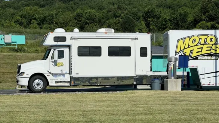 The front (motorhome) portion of this Toterhome is shown along with the hitch portion to which a trailer is attached.