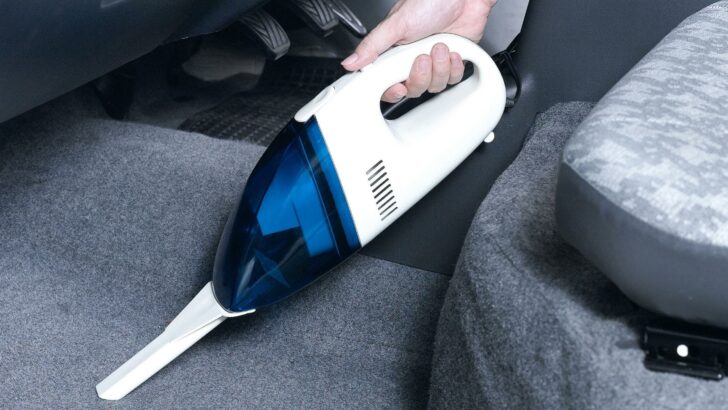 Small, hand-held RV vacuum