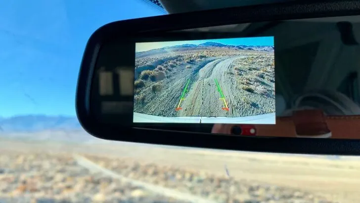 Backup image appearing in rearview mirror