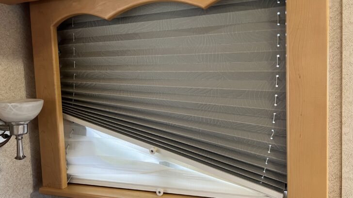 RVgeeks' old pleated shades sitting cockeyed due to the poor string tension are a good reason to get RV replacement blinds