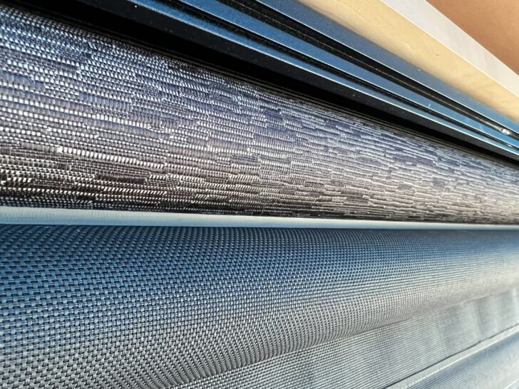 Closeup view showing the stacked rollers of our Automotion RV roller shades from Bradd & Hall