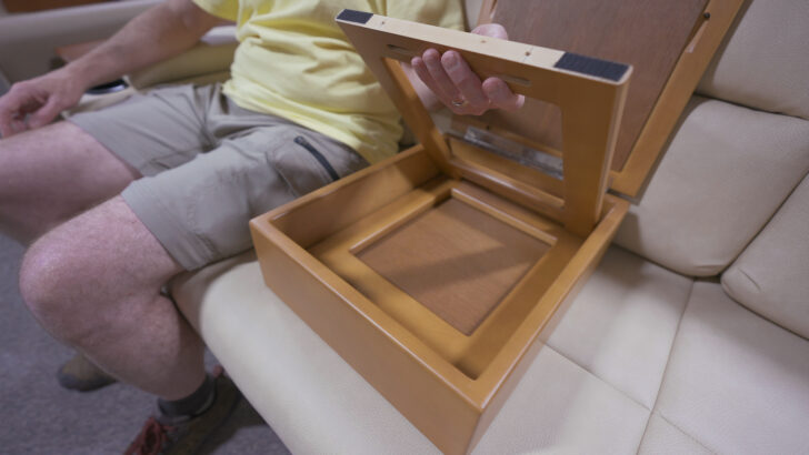 The legs of the Cubby Console table shown stored inside the RV folding table