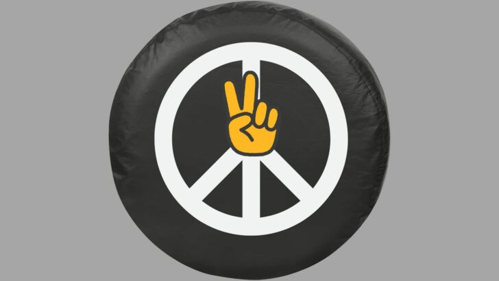 A spare tire cover with two peace signs