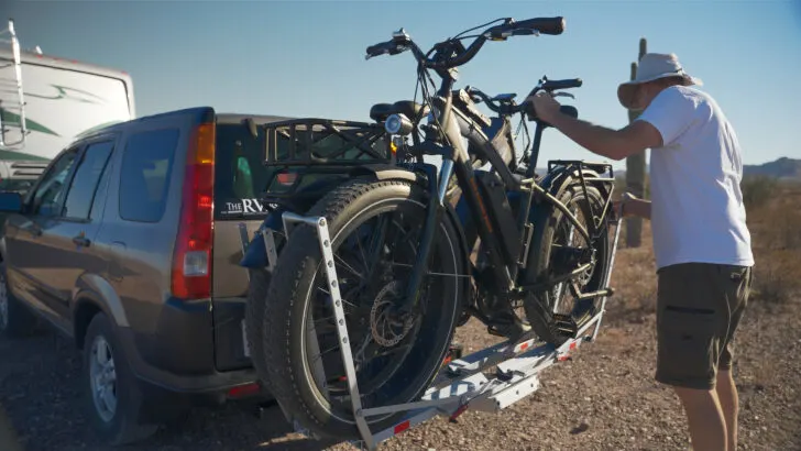A 1Up bike rack with e-bikes on the back of our SUV