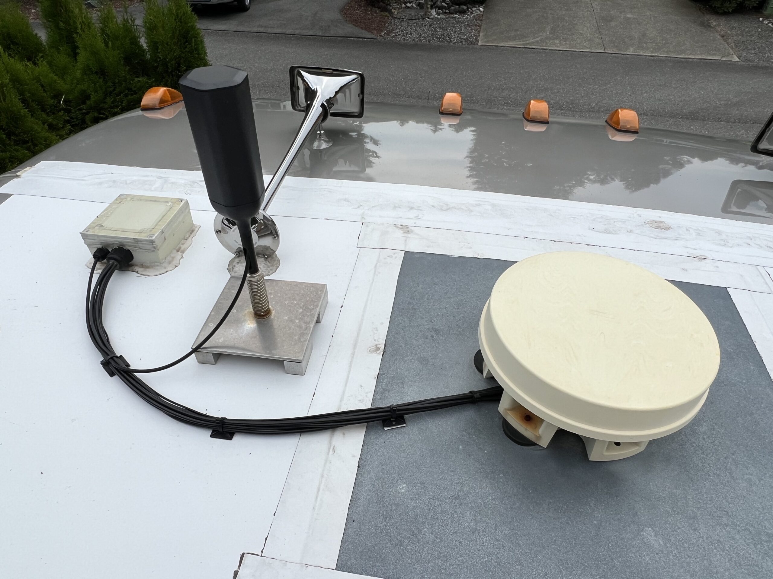 Antennas for the WeBoost cell booster (left) and Parsec Husky 7 antenna for the Pepwave system (right)