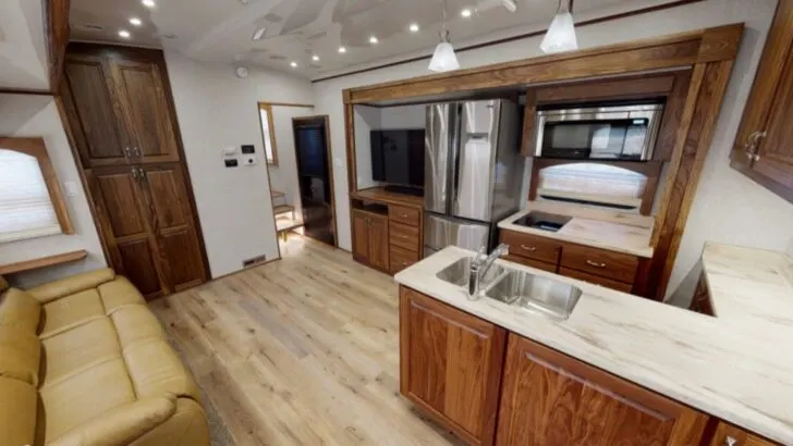 Kitchen area of a luxury fifth wheel camper from SpaceCraft MFG
