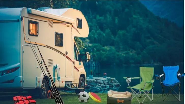 Toys and gear strewn around an RV campsite