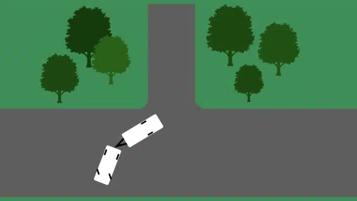 Line up with the campsite as you learn how to back up a trailer.