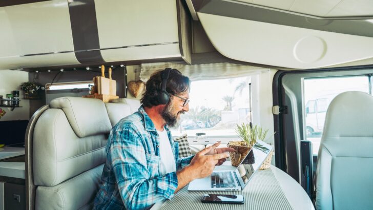 A person working remotely in an RV