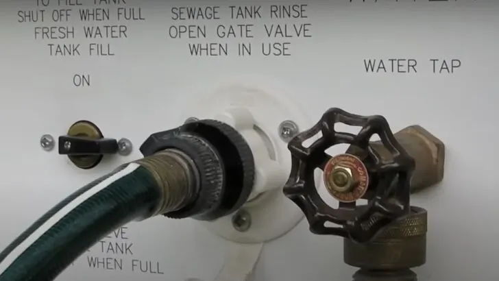 Sewage tank rinse connection shown