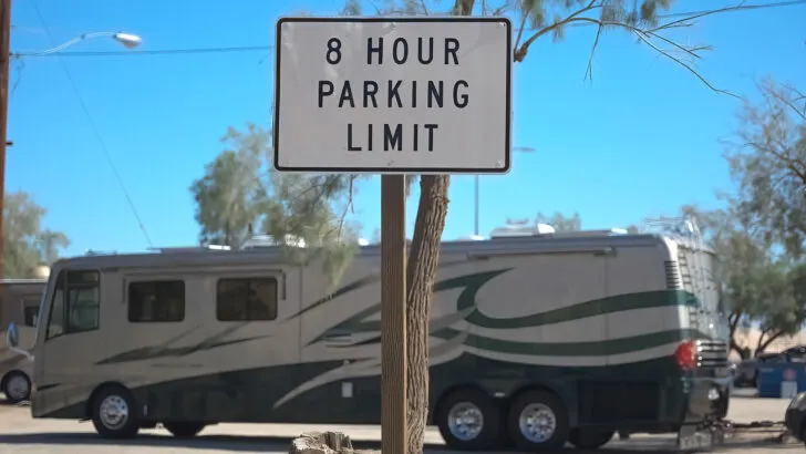 Our motorhome parked at a rest area with an 8-hour parking limit sign shown