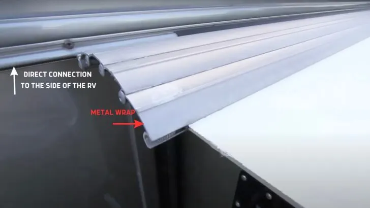 The awning's metal wrap and side of the RV described