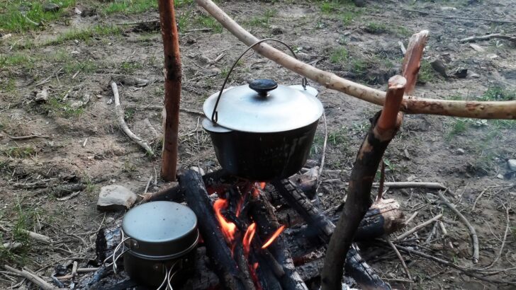 Pots being heated over an open fire