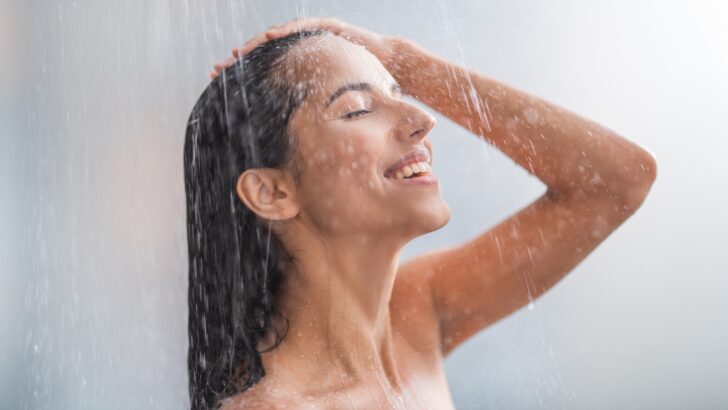 A woman taking a leisurely shower