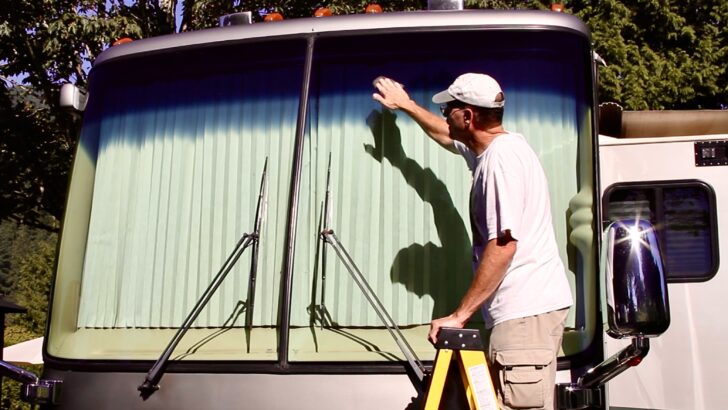 Use steel wool to clean glass, like this shot of me cleaning our RV windshield.