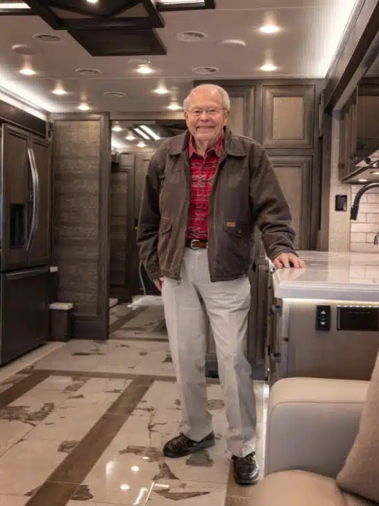 Bob Tiffin shown standing inside a Tiffin Class A motorhome.