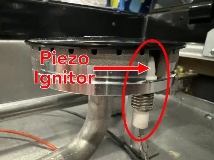 The piezo ignitor on an RV stovetop burner