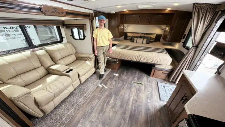 John in the living area of our new travel trailer