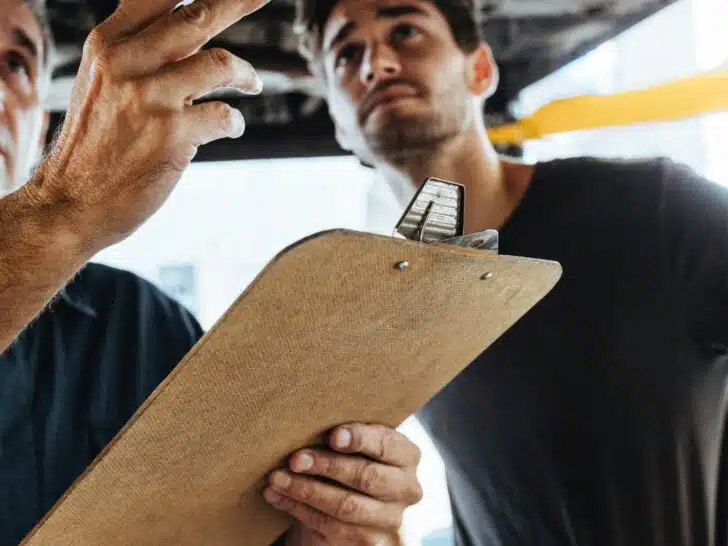 Two men inspecting a location