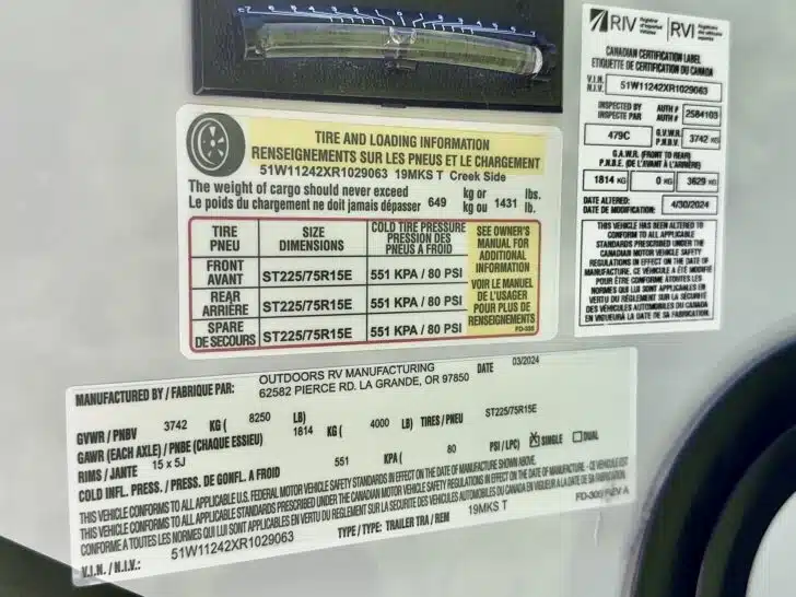 The weight limit placards on the side of our travel trailer