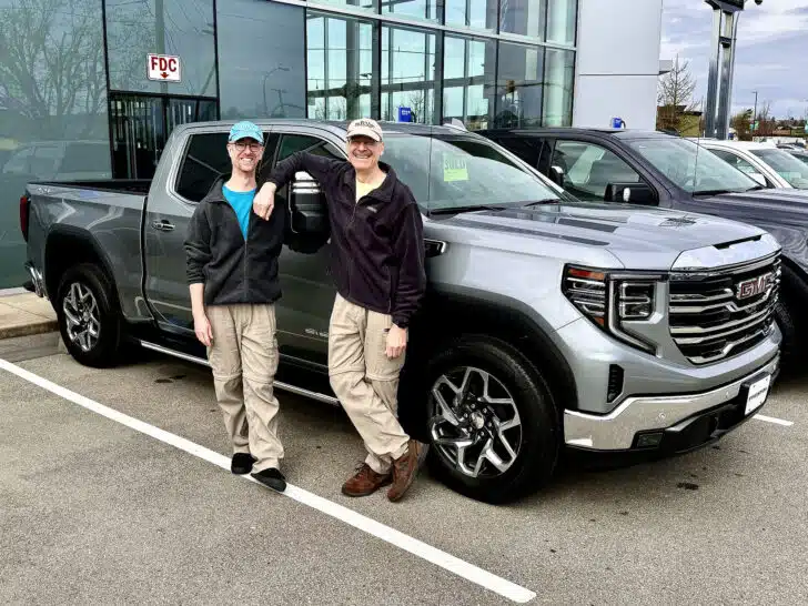 The RVgeeks with their new truck on the day we bought it